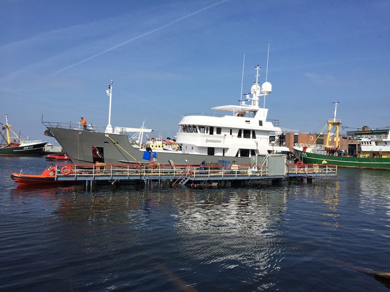 Superyacht Sandalphon goes back into the water after rebuild at Balk Shipyard with the lifting system.
